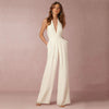 Djup V-ringad rygglös jumpsuit