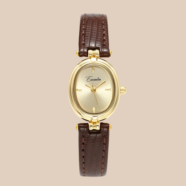 Sienna - elegant kvartsklocka med guldfärgat armband