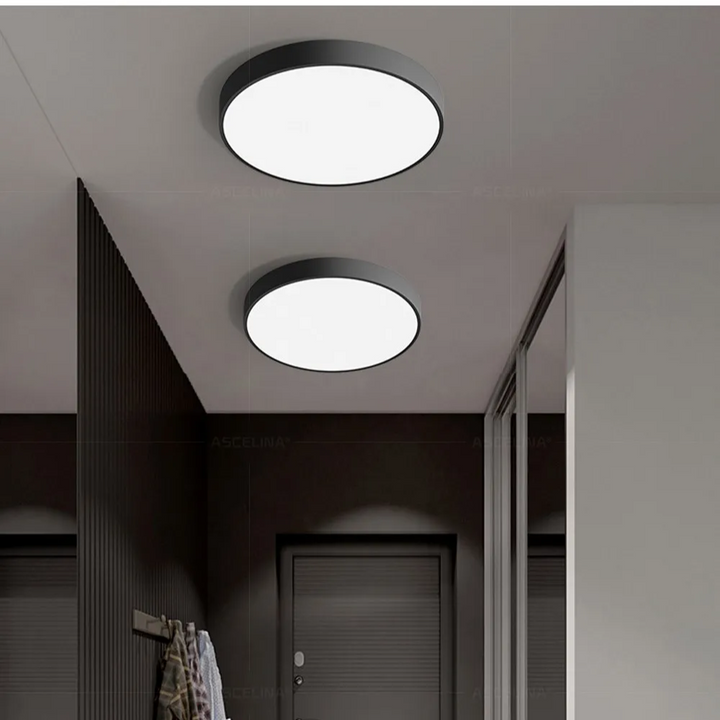 Rund LED-taklampa med ram i metall