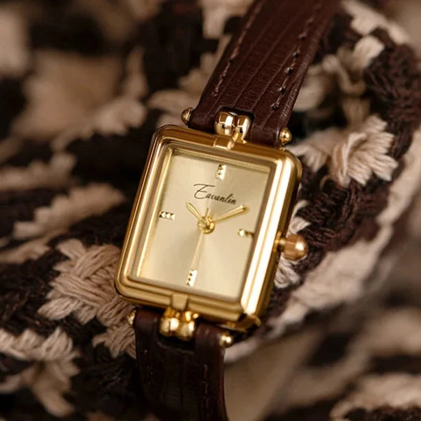 Sienna - elegant kvartsklocka med guldfärgat armband