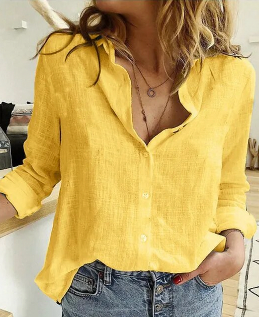 Långärmad blus med elegant drapering och mjukt tyg