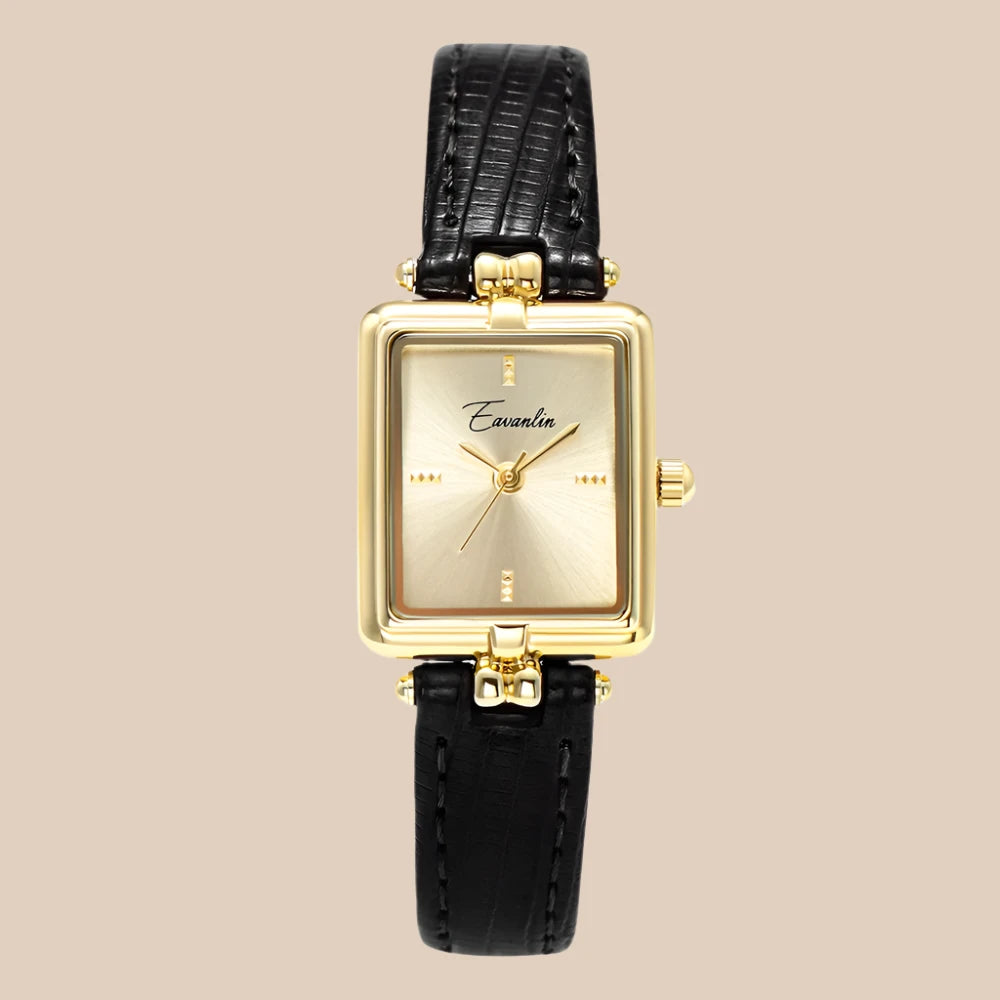 Sienna - elegant kvartsklocka med guldfärgat armband