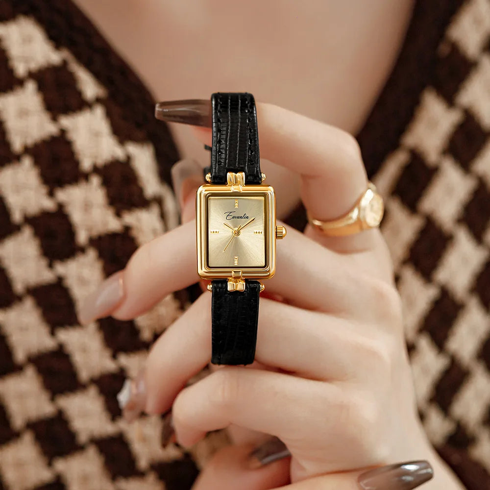 Sienna - elegant kvartsklocka med guldfärgat armband