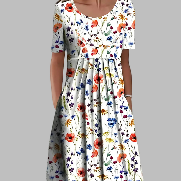 Sommarklänning i vintage-stil med blommor och volanger
