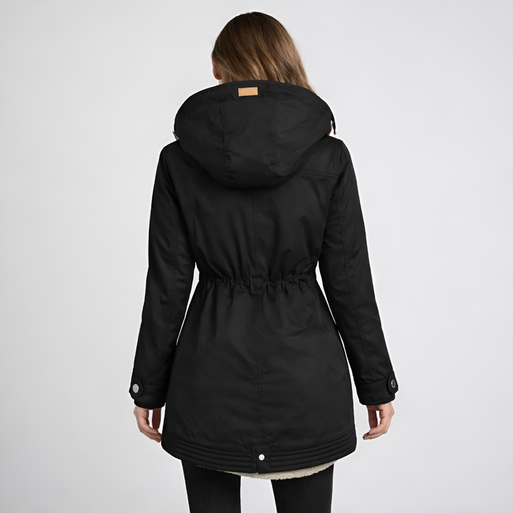 Dameparka med foret hætte og snøre i taljen