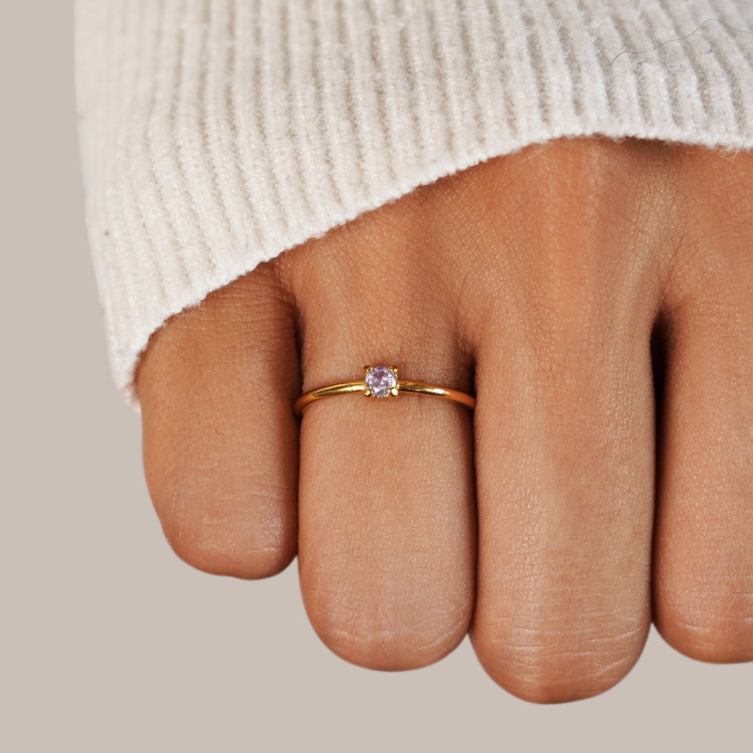 Mjuk guldring med födelsesten