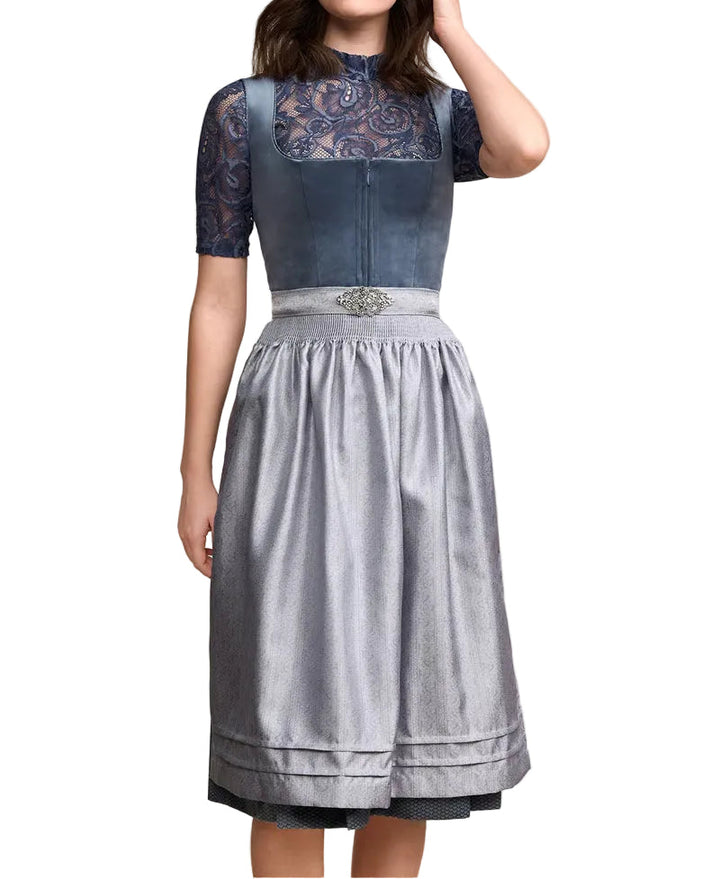 Dirndl dam med dekorativ kant, förkläde och plisserad kjol