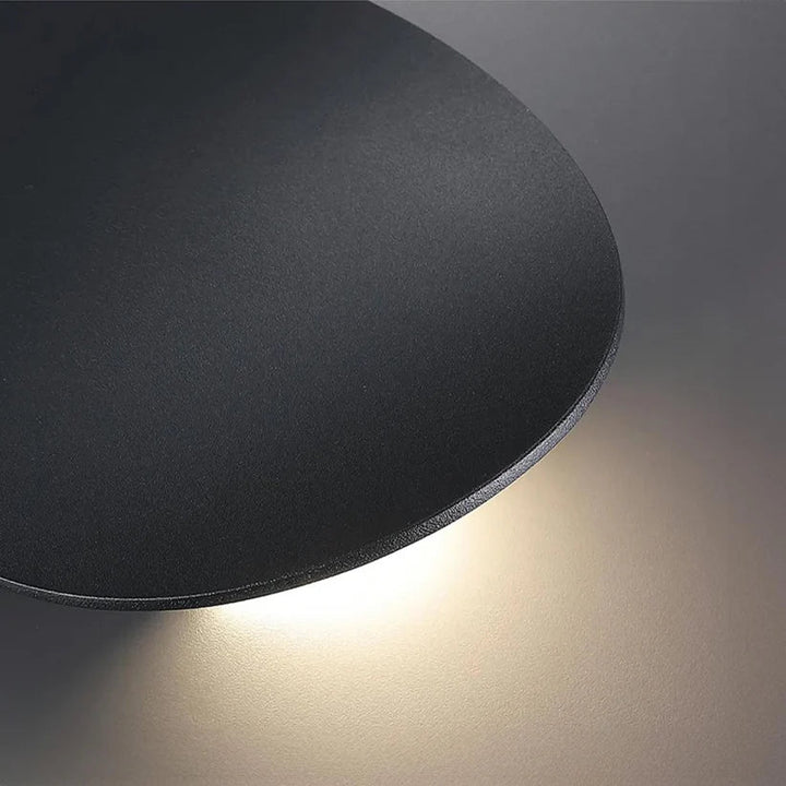 Disk vägglampa i metall