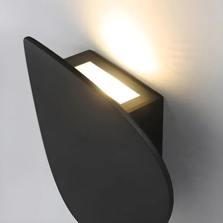 Disk vägglampa i metall