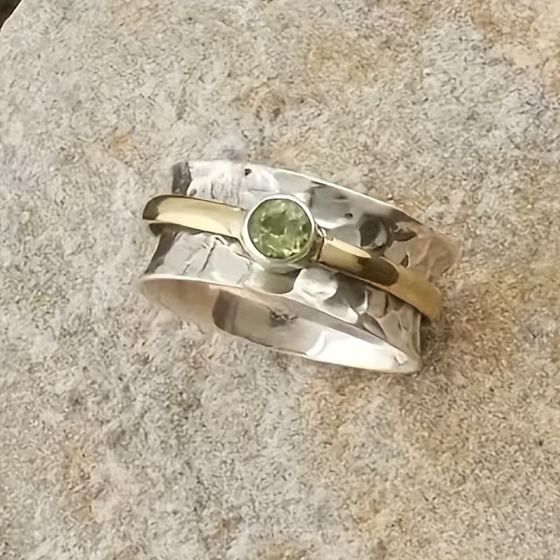 Förfinad ring med grön zirkonia