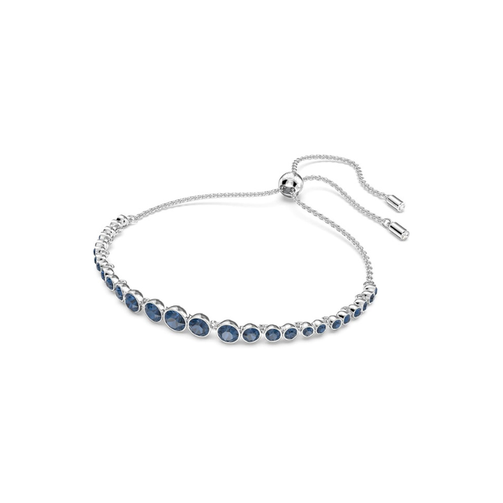 Elegant tennisarmband i vitguld med slipad safir
