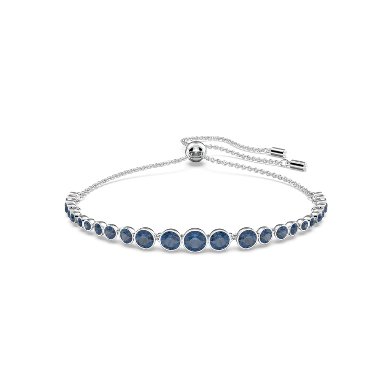 Elegant tennisarmband i vitguld med slipad safir