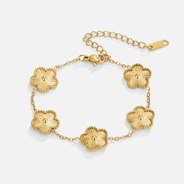 Armband i guld med klöver