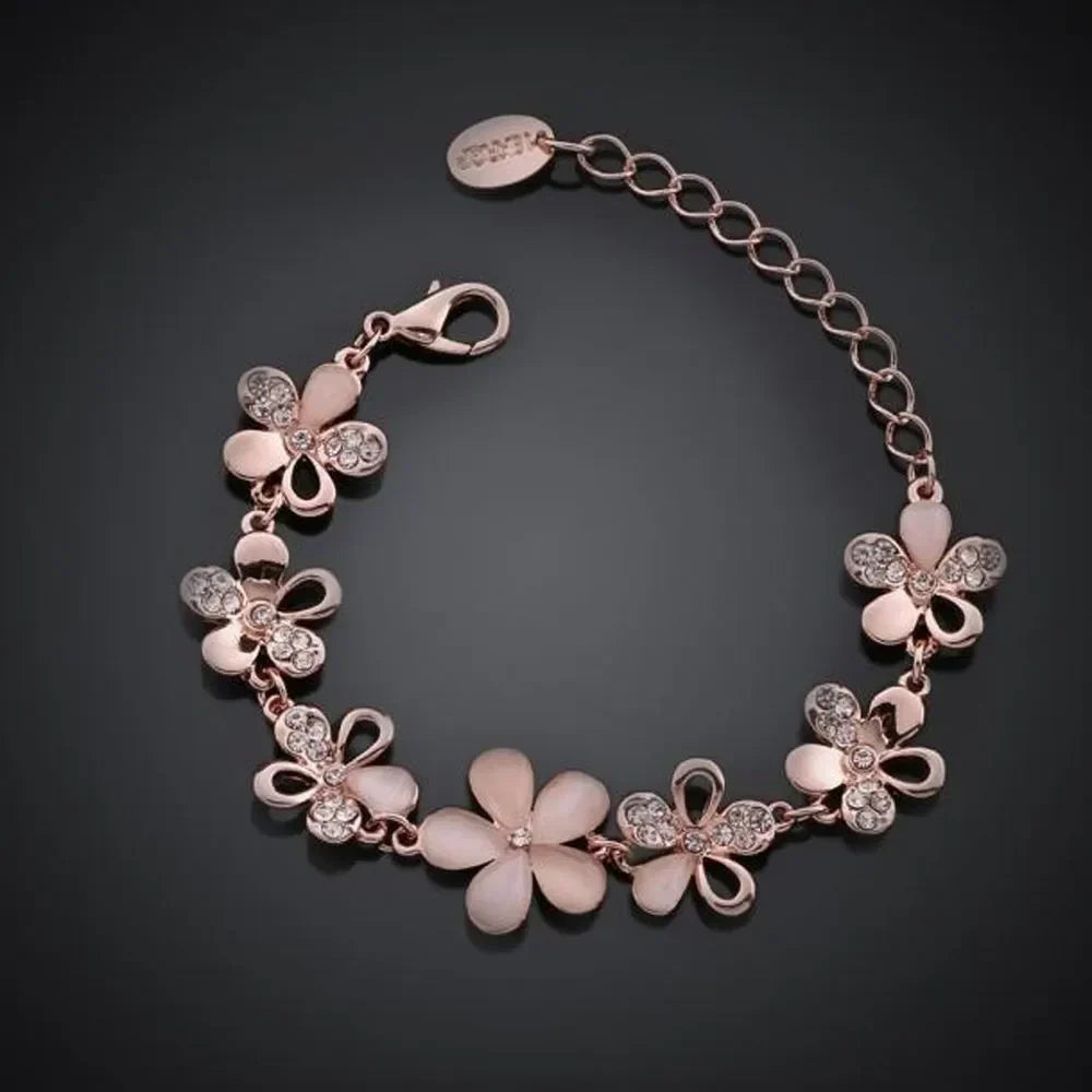 Elegant rosblomsarmband i roséguld