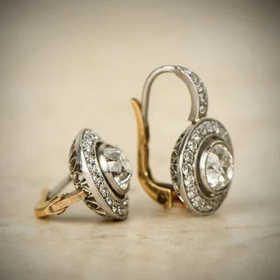 Eleganta silverörhängen med zirkonia och guldaccenter