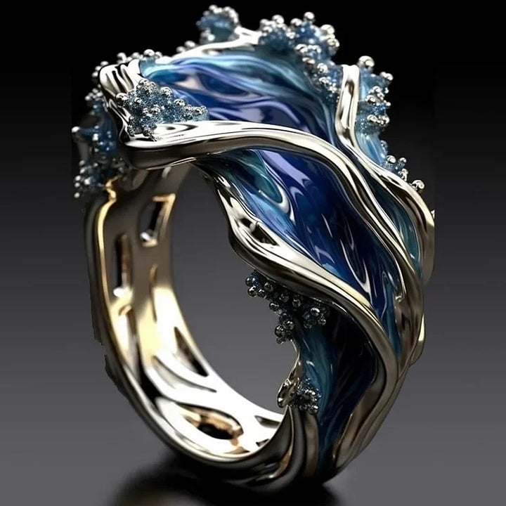 Elegant guldring med vågmotiv