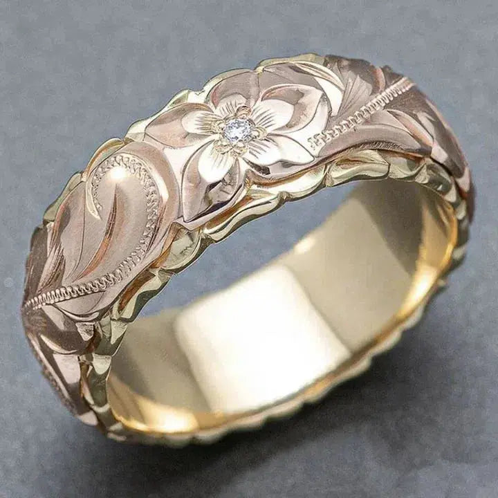 Romantisk guldring med rosblomsdesign