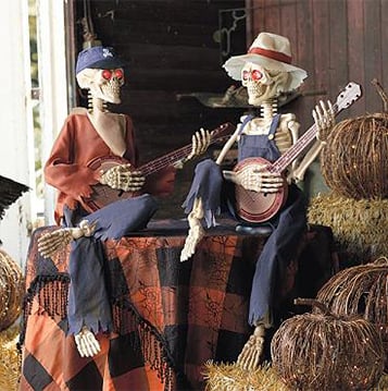 Hauntique animerad skelettduo | Halloweendekoration med ljud- och rörelseaktivering, musik och ljus