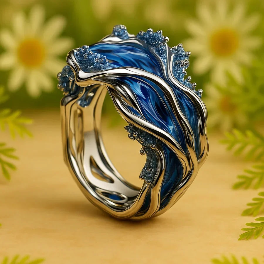 Elegant guldring med vågmotiv