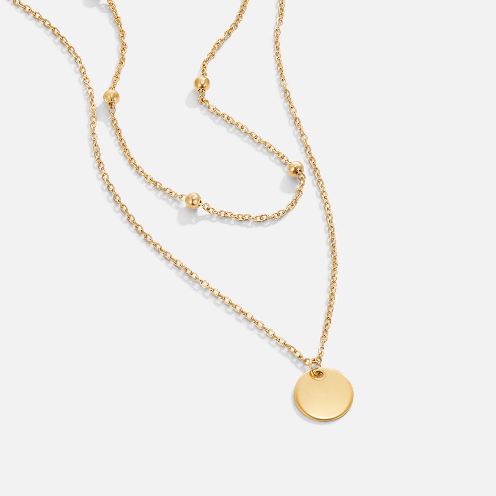 Halsband med skivor i lager