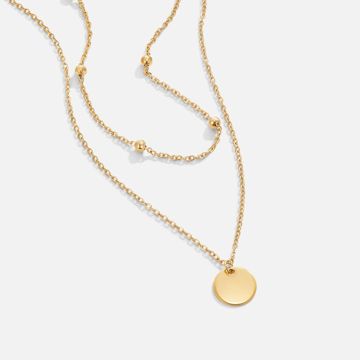 Halsband med skivor i lager