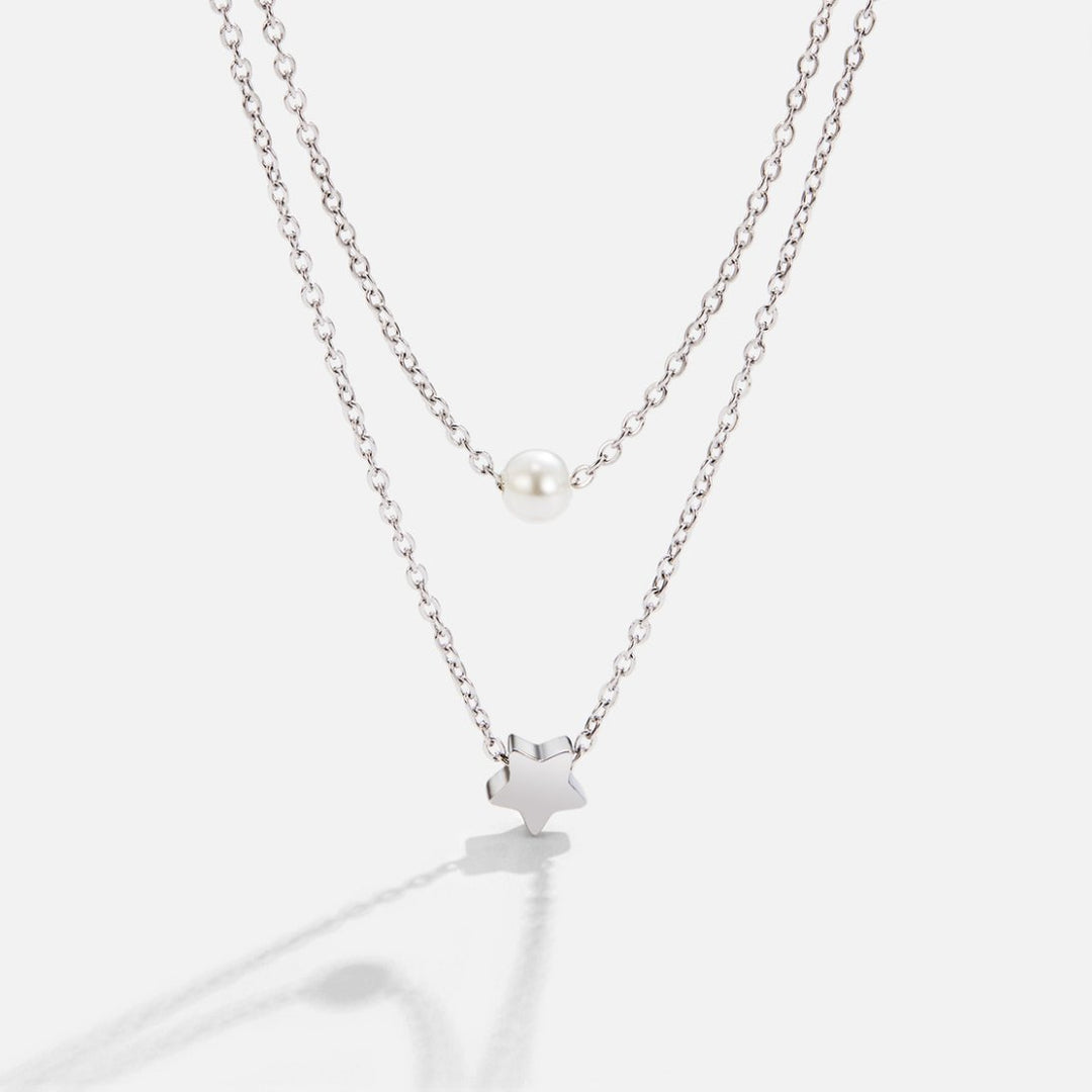 Förfinat silverhalsband med stjärnor och pärlor