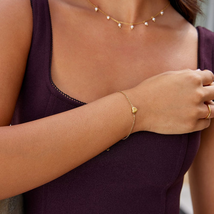 Armband med hjärta och bokstav