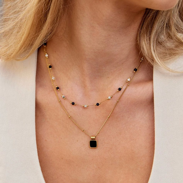 Lucia Svart Hängande Halsband