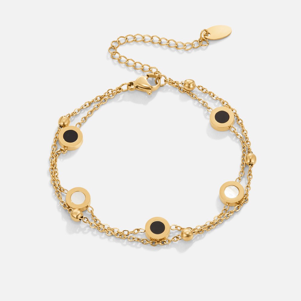 Elegant armband med onyx och vit sten