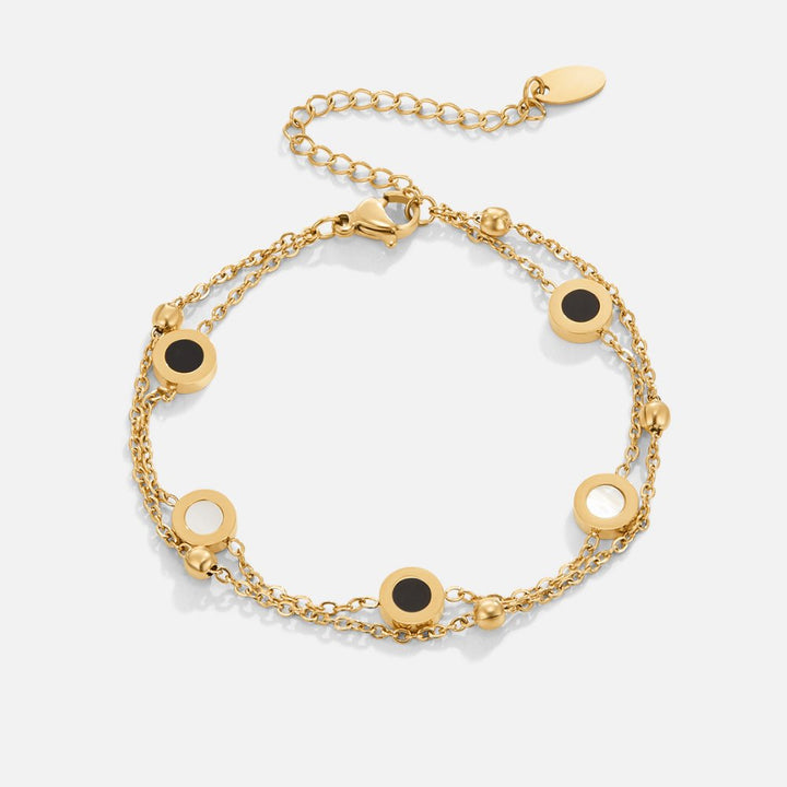 Elegant armband med onyx och vit sten