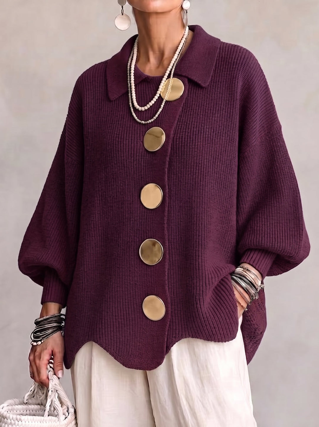 Elegant oversized-cardigan med iögonfallande knappar