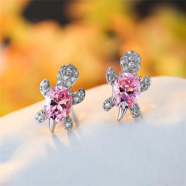 Eleganta silverörhängen med zirkonia och tångdesign