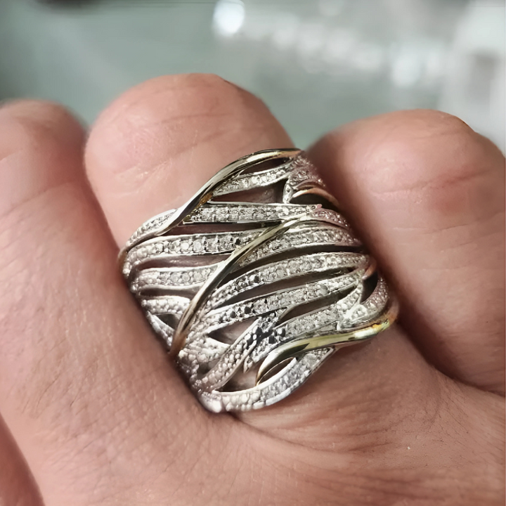 Förfinad vriden ring i roséguld