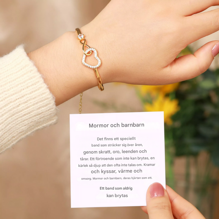 Kvinnors Infinity Heart Armband