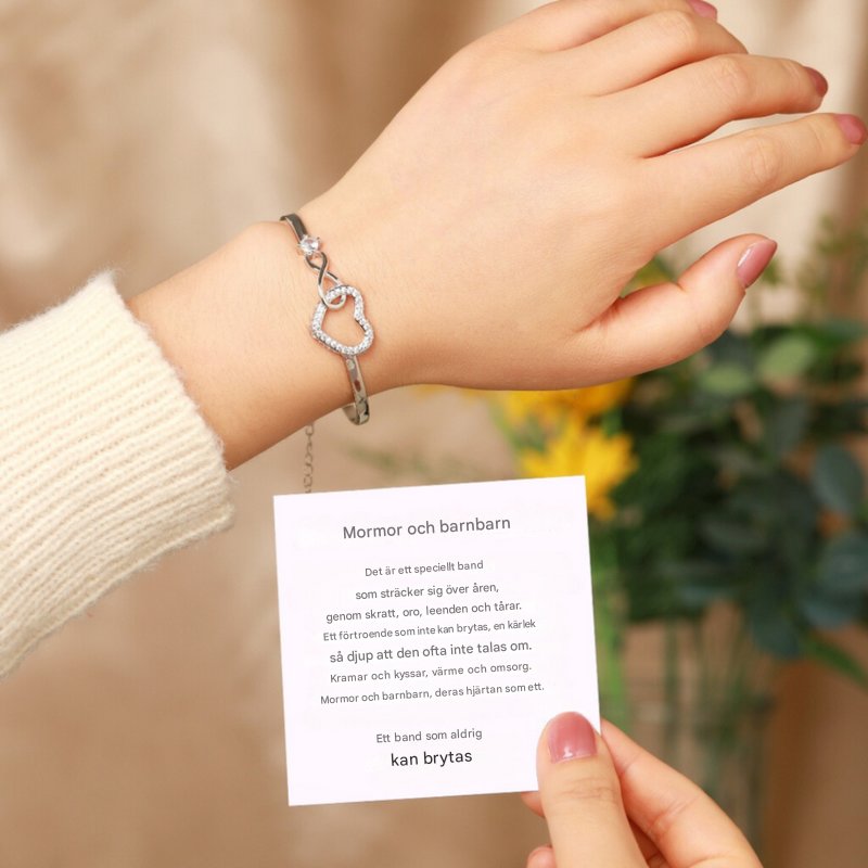 Kvinnors Infinity Heart Armband