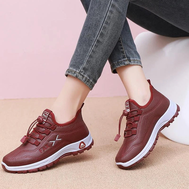 Vattentäta sneakers med snörning och fleecefoder för dam