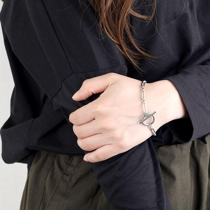 Elegant T-Bar-armband i vitguld